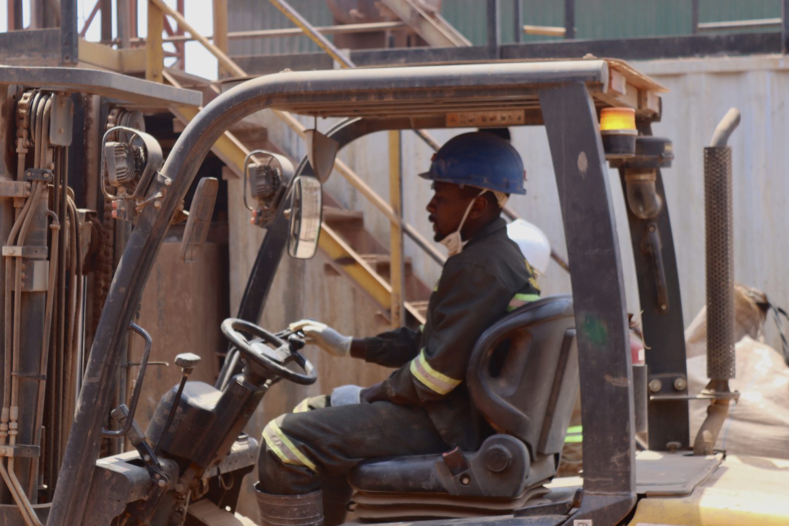 Team member operating a forklift at the plant